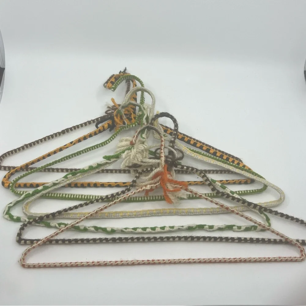 7 vintage wire hangers wrapped in yarn multi color as is